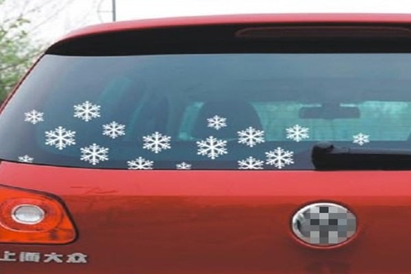 Snowflake stickers in red car