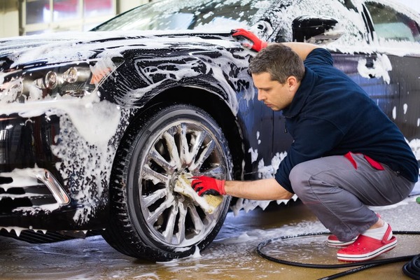 man washing the car