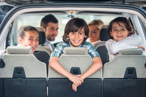 family in car