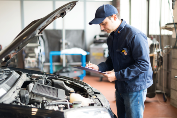 Mechanic examining a car